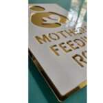 CUSTOMISED WHITE GOLD SIGNAGE